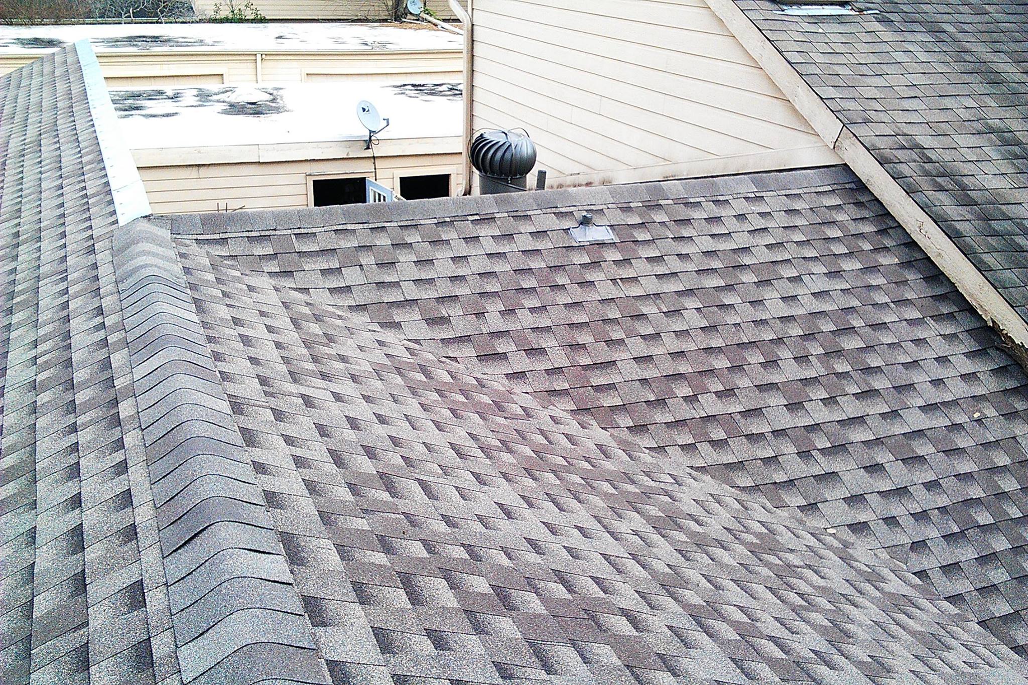Residential shingle roof completed by CRC